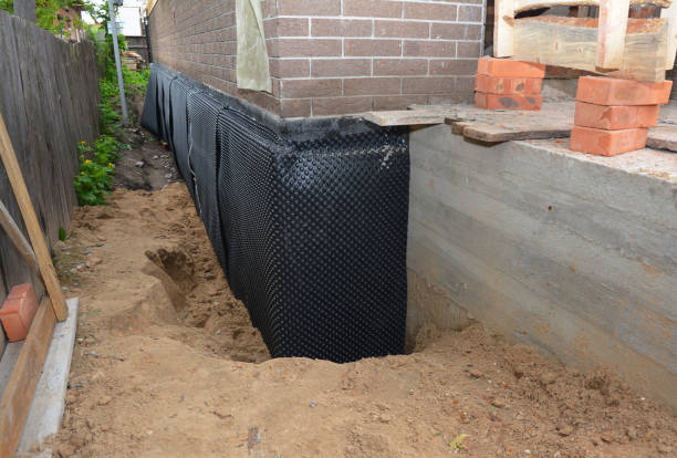SJ Waterproofing Pros technician performing targeted Vapor Barrier Installation assessment in Ashley, PA